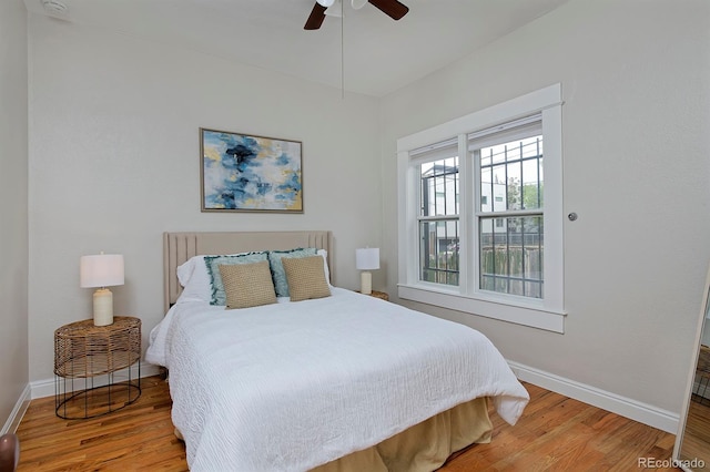 2424 N Clay St, Denver, CO 80211 - bedroom featuring baseboards, wood finished floors, and a ceiling fan
