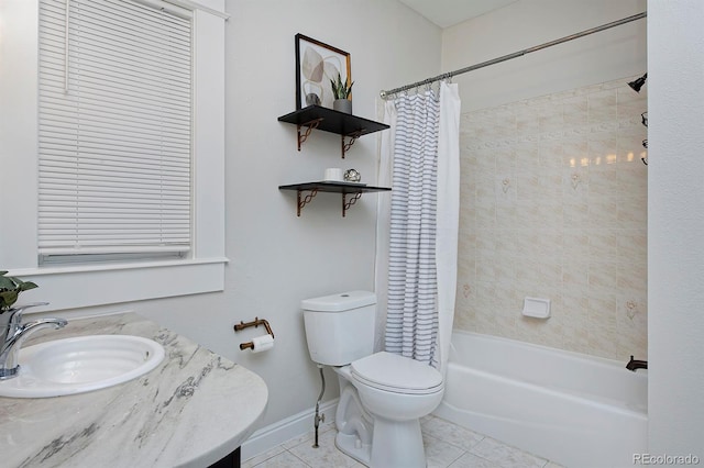 2424 N Clay St, Denver, CO 80211 - full bathroom featuring tile patterned floors, toilet, shower / bath combo, baseboards, and vanity