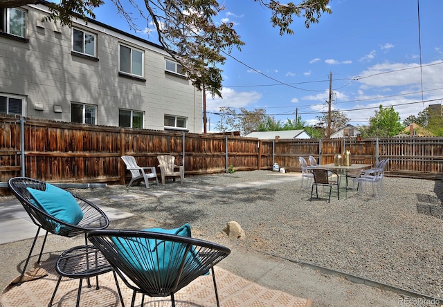 2424 N Clay St, Denver, CO 80211 - fenced backyard featuring a patio area