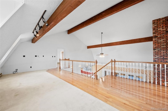 6231 Prospect Rd, Longmont, CO 80503 - unfurnished living room featuring ceiling fan and wood finished floors