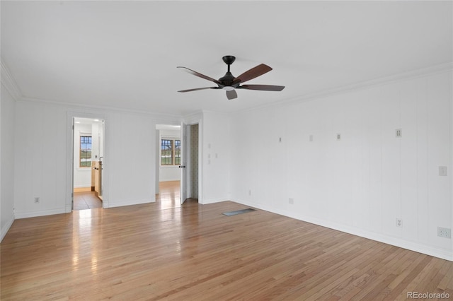 6231 Prospect Rd, Longmont, CO 80503 - spare room with ornamental molding, ceiling fan, light wood finished floors, and baseboards