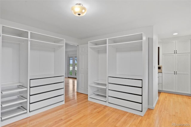 6231 Prospect Rd, Longmont, CO 80503 - spacious closet with wood finished floors