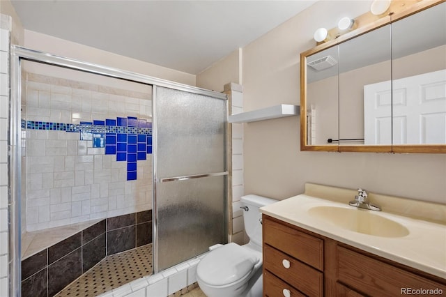 6231 Prospect Rd, Longmont, CO 80503 - bathroom with toilet, a shower stall, and vanity