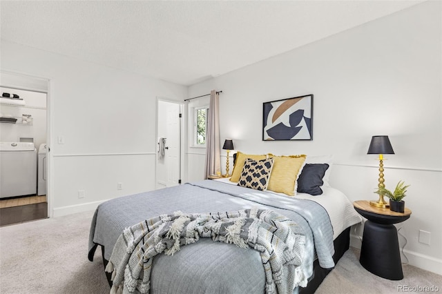 8335 Fairmount Dr Unit 208, Denver, CO 80247 - carpeted bedroom featuring separate washer and dryer and baseboards