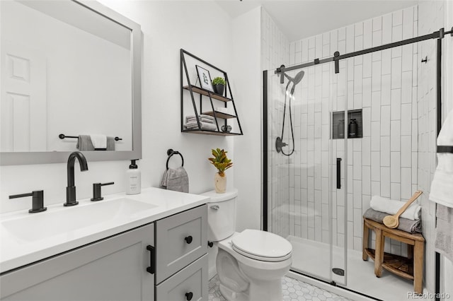 8335 Fairmount Dr Unit 208, Denver, CO 80247 - bathroom featuring vanity, a shower stall, and tile patterned flooring