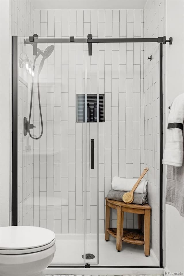 8335 Fairmount Dr Unit 208, Denver, CO 80247 - bathroom featuring a stall shower