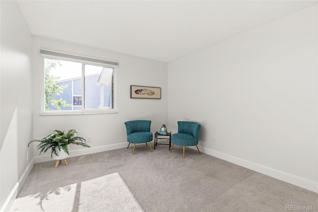 8335 Fairmount Dr Unit 208, Denver, CO 80247 - living area with carpet and baseboards
