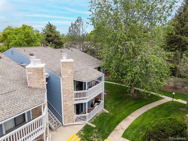 8335 Fairmount Dr Unit 208, Denver, CO 80247 - view of property featuring view of wooded area