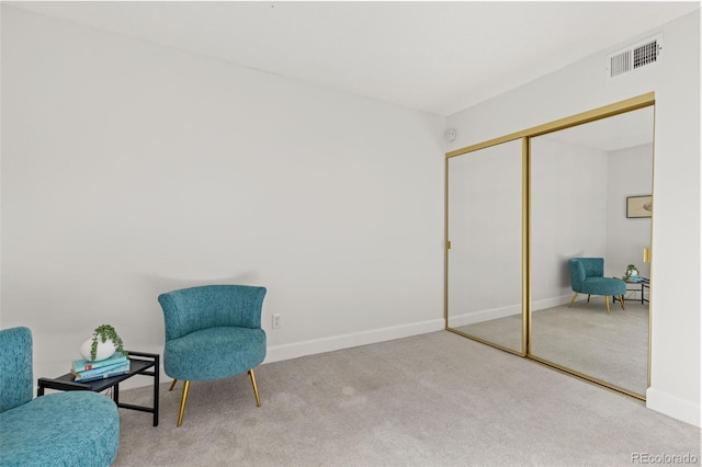 8335 Fairmount Dr Unit 208, Denver, CO 80247 - living area featuring carpet flooring and baseboards