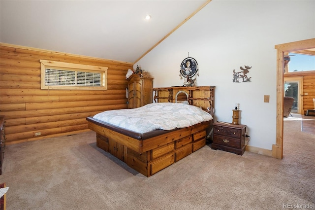 bedroom with carpet floors, rustic walls, and high vaulted ceiling