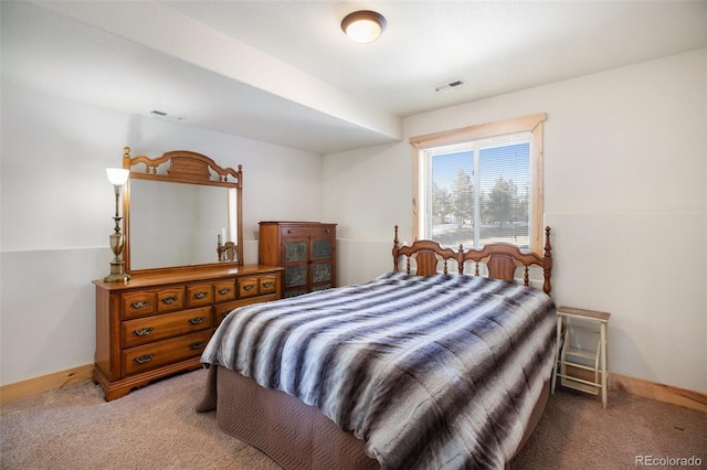 bedroom featuring carpet