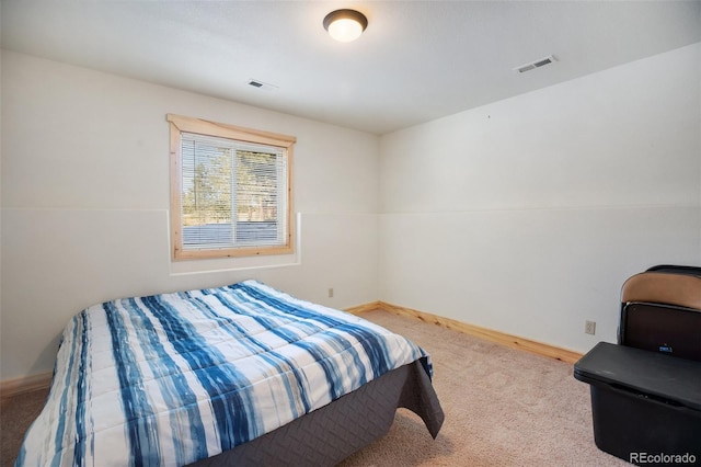 bedroom featuring carpet flooring and vaulted ceiling