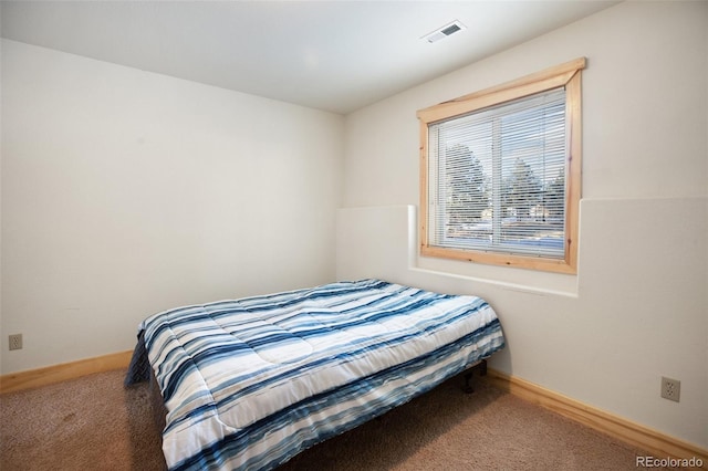 bedroom featuring carpet floors