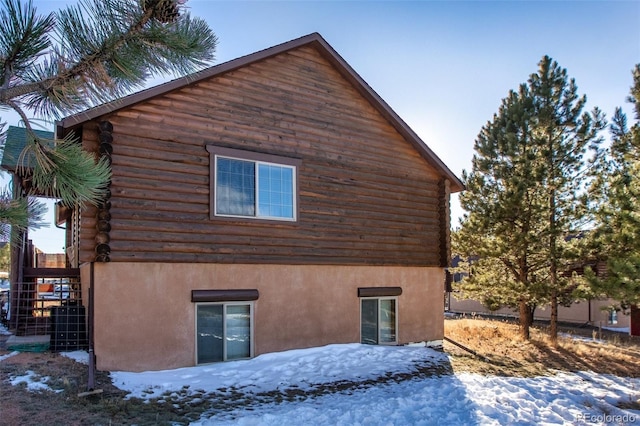 view of snow covered property