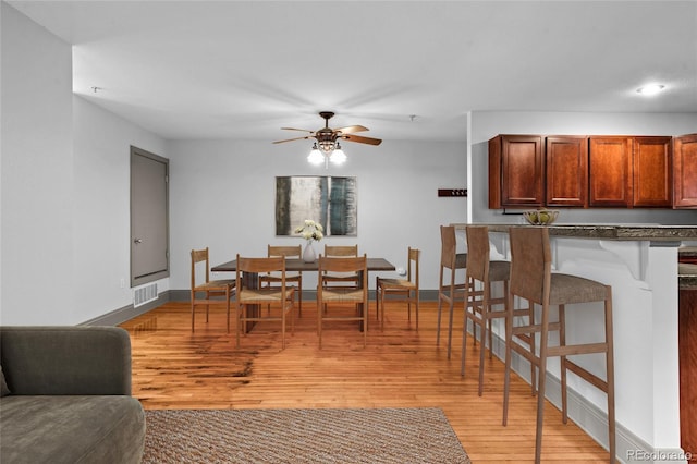 3211 Zuni St Unit 14, Denver, CO 80211 - dining space featuring a ceiling fan, light wood-style flooring, baseboards, and recessed lighting