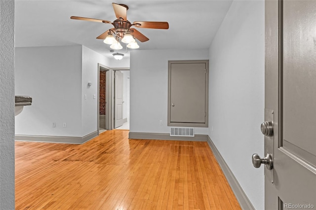 3211 Zuni St Unit 14, Denver, CO 80211 - empty room with ceiling fan, hardwood / wood-style flooring, and baseboards
