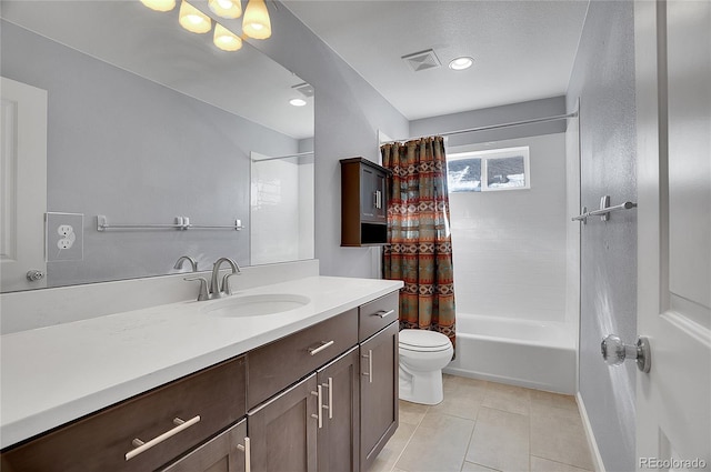 bathroom featuring visible vents, vanity, shower / bath combination with curtain, toilet, and tile patterned floors