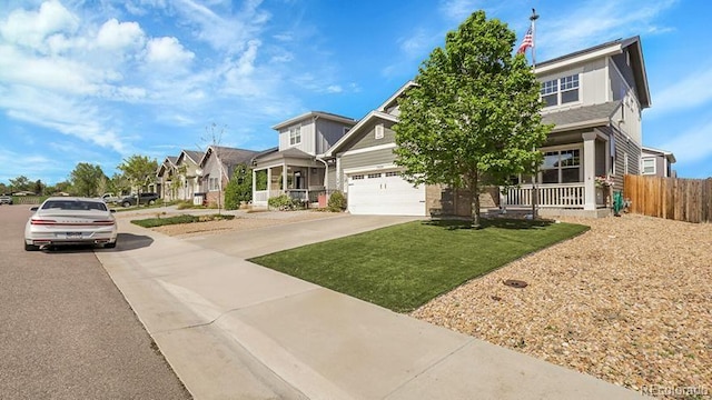 7888 Tejon St, Denver, CO 80221 - craftsman inspired home featuring driveway, a garage, a porch, and a residential view