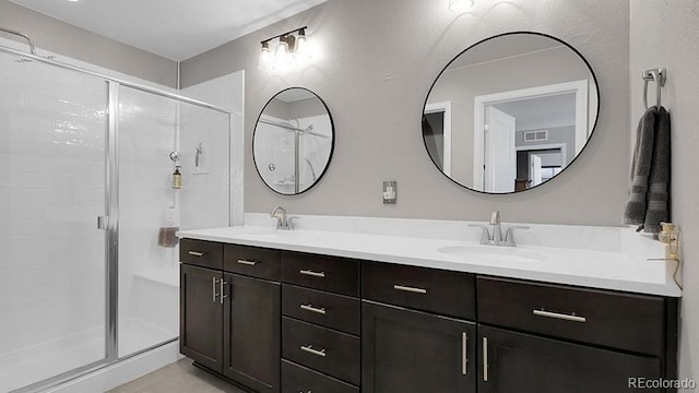 7888 Tejon St, Denver, CO 80221 - full bath featuring a shower stall and double vanity