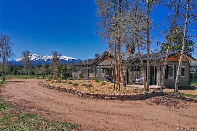 view of front facade with a mountain view