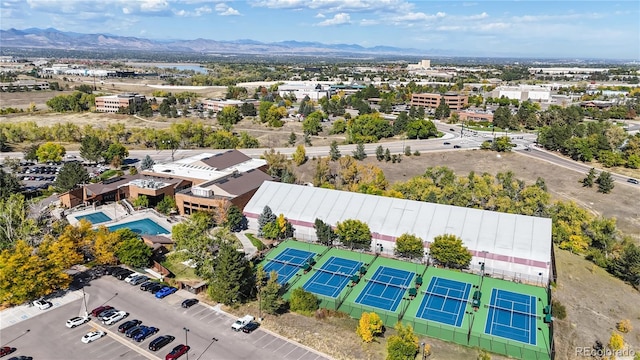 birds eye view of property featuring a mountain view