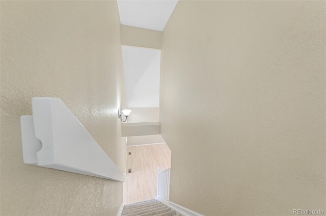 3565 W 112th Cir, Westminster, CO 80031 - stairs with baseboards and a textured wall