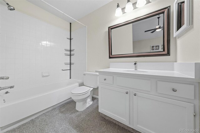 3565 W 112th Cir, Westminster, CO 80031 - bathroom featuring toilet, tub / shower combination, vanity, a ceiling fan, and baseboards