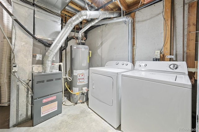 3565 W 112th Cir, Westminster, CO 80031 - laundry area with water heater and washing machine and dryer