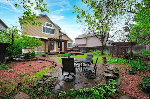 3565 W 112th Cir, Westminster, CO 80031 - view of yard with a pergola, a deck, a patio, and outdoor dining space