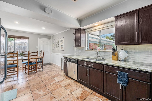 120 Field St, Lakewood, CO 80226 - kitchen featuring stainless steel dishwasher, a sink, crown molding, decorative backsplash, and dark brown cabinets