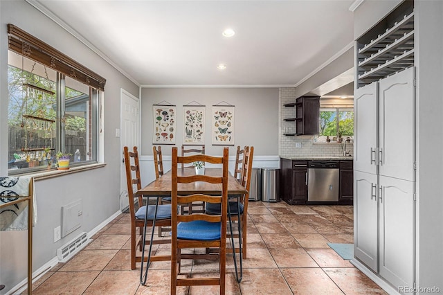 120 Field St, Lakewood, CO 80226 - dining space with ornamental molding and recessed lighting