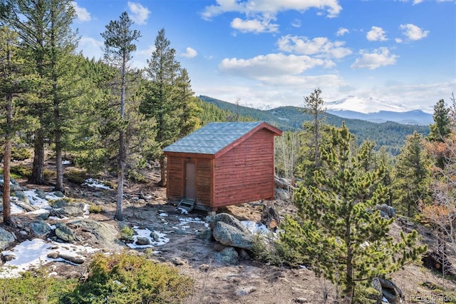 600 Rock Lake Rd, Ward, CO 80481 - view of shed with a view of trees and a mountain view