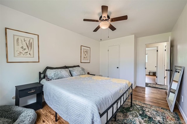 18662 E Brown Pl, Aurora, CO 80013 - bedroom with wood finished floors and ceiling fan