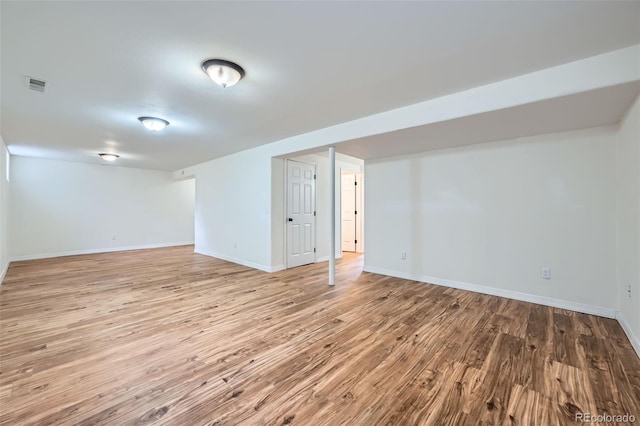 18662 E Brown Pl, Aurora, CO 80013 - finished basement featuring wood finished floors and baseboards