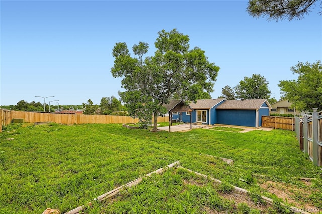 18662 E Brown Pl, Aurora, CO 80013 - fenced backyard with a patio area