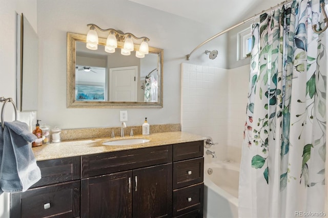 bathroom featuring vanity and shower / bath combo