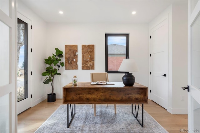 home office featuring light wood-type flooring