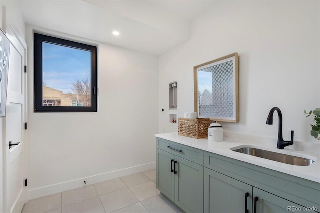 bathroom with sink and tile patterned floors