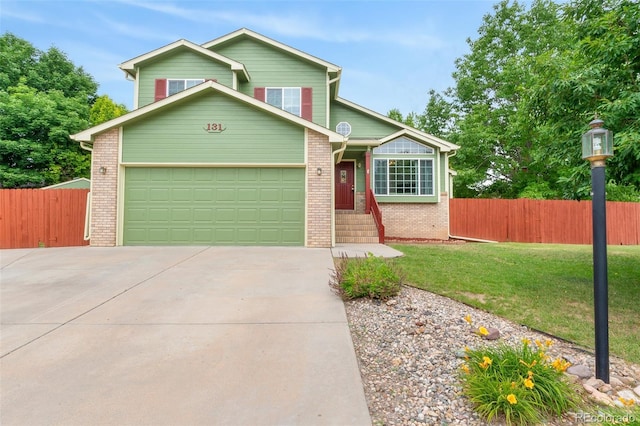 131 Morgan Ct, Loveland, CO 80537 - traditional home featuring brick siding, driveway, and a garage