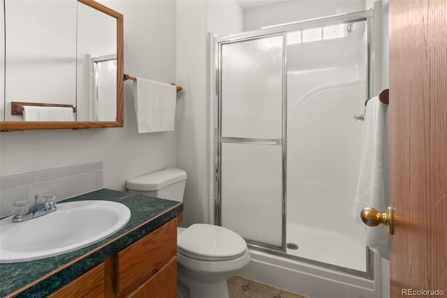 131 Morgan Ct, Loveland, CO 80537 - full bathroom with a shower stall, vanity, and backsplash