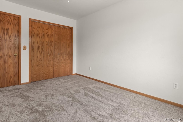 131 Morgan Ct, Loveland, CO 80537 - unfurnished bedroom featuring carpet flooring and a closet