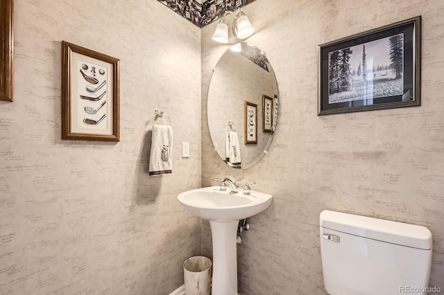 7758 Edgewater Ct, Lone Tree, CO 80124 - bathroom with toilet and a sink