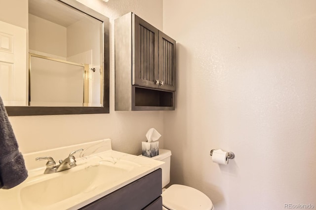 7758 Edgewater Ct, Lone Tree, CO 80124 - full bathroom with toilet, an enclosed shower, and vanity