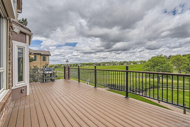 7758 Edgewater Ct, Lone Tree, CO 80124 - deck with grilling area and a yard