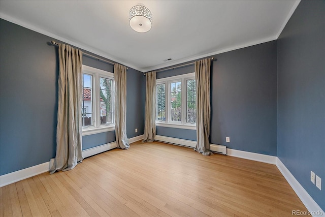 371 Birch St, Denver, CO 80220 - unfurnished room featuring light wood-type flooring, baseboards, and crown molding