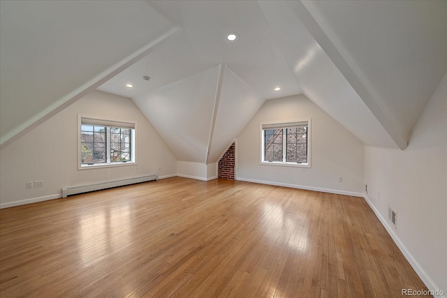 371 Birch St, Denver, CO 80220 - bonus room featuring vaulted ceiling, a baseboard heating unit, light wood-style floors, visible vents, and recessed lighting