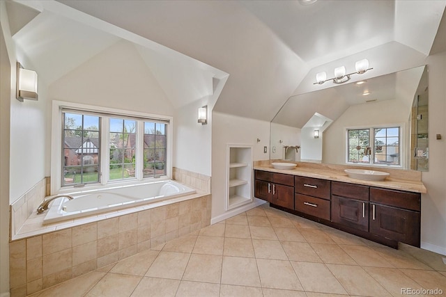 371 Birch St, Denver, CO 80220 - full bathroom featuring lofted ceiling, a bath, a sink, and tile patterned flooring