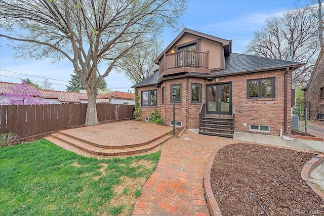 371 Birch St, Denver, CO 80220 - back of house featuring french doors, fence, a patio area, a shingled roof, and a balcony