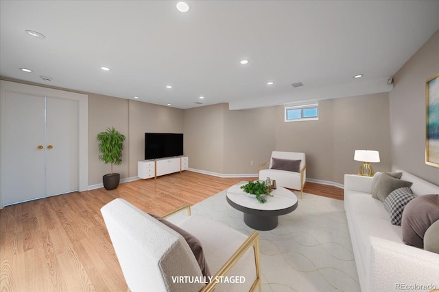 371 Birch St, Denver, CO 80220 - living area featuring light wood-style flooring, baseboards, and recessed lighting