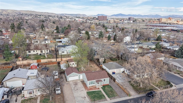 aerial view featuring a mountain view and a residential view